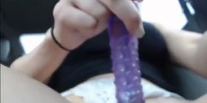 Amazing blonde plays with dildo and squirts in car