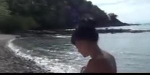 Sexy amateur brunette rubbing her cunt on a cliff