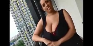 Big natural boobs on balcony