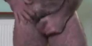 Hairy Daddy Strokes His Cock