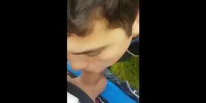 Twink sucking cock in the park and getting the cum