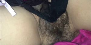 Spraying her hairy vagina with cum