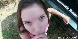 Naughty amateur girl blows cock outdoor
