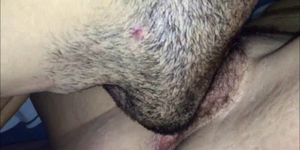 Taking care of her hairy vagina
