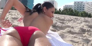 Busty beach girlfriend shows off booty