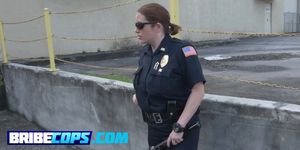 Wild MILF cops sharing a big black cock with each other