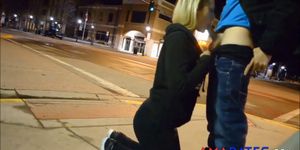 Teen gives sidewalk blowjob in the street