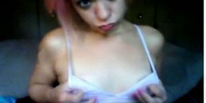 stoned girl plays with small tits and nipples