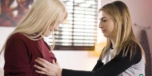 Petite blonde teen showing the lesbian way to a schoolg