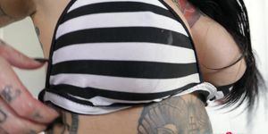Tattooed pornstar in lusty deep throating action