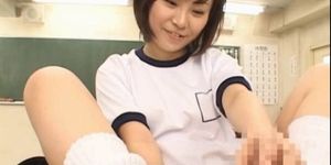 Shy Japanese girl in college giving footjob in classroo