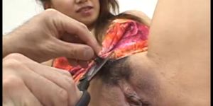 Asian babe shaving her hairy pussy