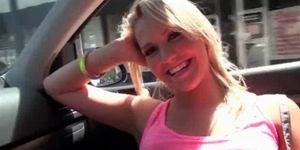 Blonde in glasses flashing big tits in the car
