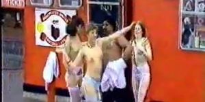 3 Girls Stripping in front of a crowd