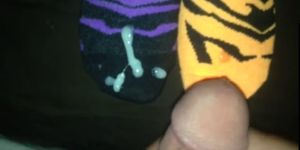 Cumming on mismatched zebra ankle socks