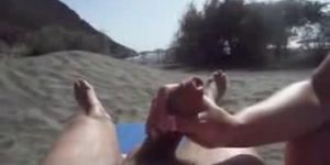 big tit amateur gives hubby hj at the beach twice