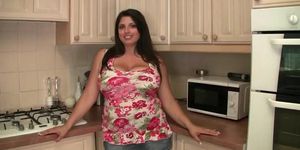 Mature BBW Kerry shows off her big tits in the kitchen