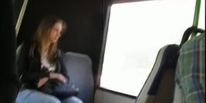 Girl flashing tan stockings and skull panties in bus