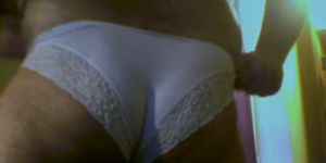 Playing with white lace panties
