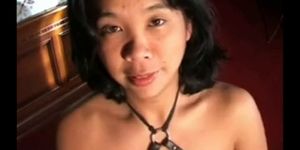 Exposed Asian Mature Hooker swallows