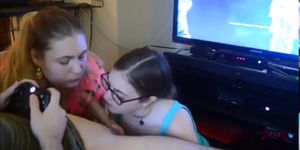 Two friends sucking a gamer dick