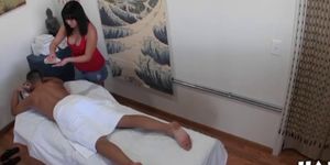 Busty asian masseuse cockriding and tugging
