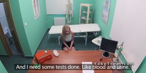Blonde masturbates in doctors bathroom