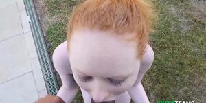 Redhead Babe Eating Black Cock Outside