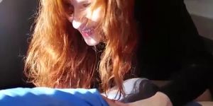 Natural redhead gives a blowjob after workout session