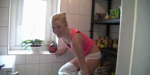 German blonde takes it anal in the laundry room