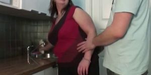 Boy fuck mom in the kitchen