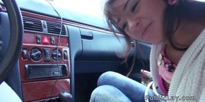 Brunette teen fucking in the car in public