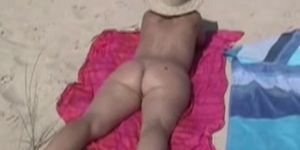 Voyeur woman on beach