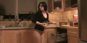 in pantyhose in the kitchen