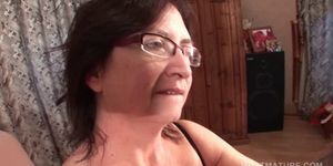 Mature in glasses taking hard cock for a blow