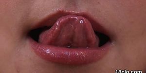 Erotic teenie is stretching wet pussy in closeup and ha