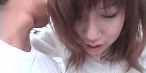 Nasty natural Asian teen giving fine blowjob in a publi