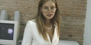 Horny office slut plays with her pussy