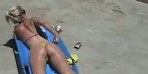 Blonde MILF likes eating cum while sunbathing