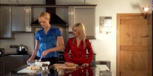 two blond girls in the kitchen