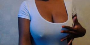 Large black breasts with great nipples being played wit