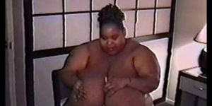 A 5 foot tall big black woman with huge tits.