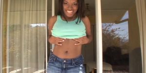 Ebony hottie has a shaved pussy and perfect tits