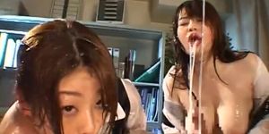 2 Naughty Asian teens share a hard meat in the kitchen