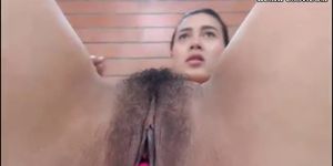 Hot Colombian with natural hairy bush and fake tits