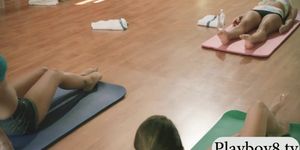 Busty trainer and her students intimate yoga session