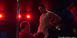 Hunky stripper gets a blowjob on the podium