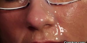 Spicy hottie gets cumshot on her face eating all the sp