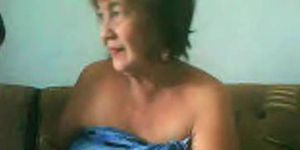Fat Granny Asian lady on cam showing goods on cam