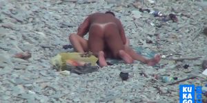 Voyeur Guy with tanned ass fuck a woman at a public bea